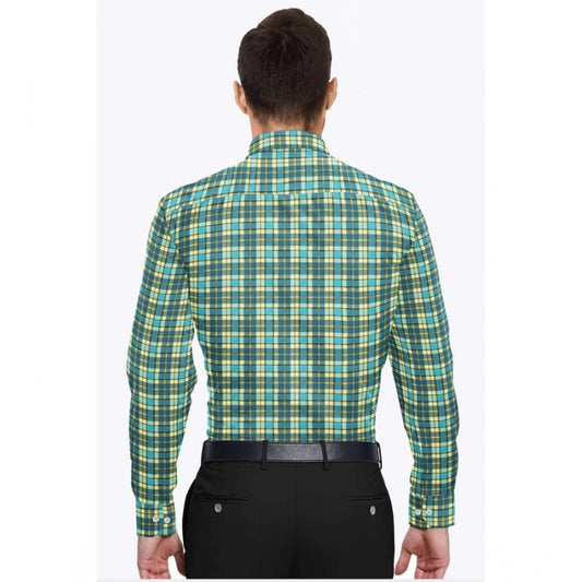 Man wearing a green and blue plaid shirt on a white background
