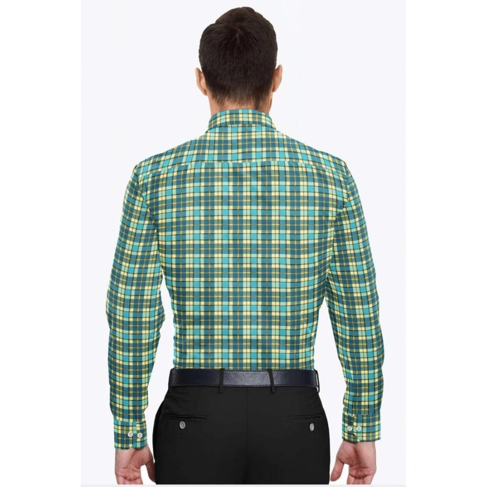 Man wearing a green and blue plaid shirt on a white background