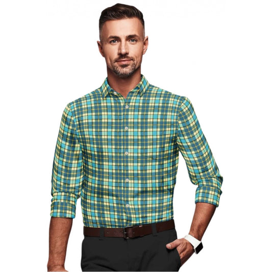 Man wearing a green and yellow plaid shirt on a white background