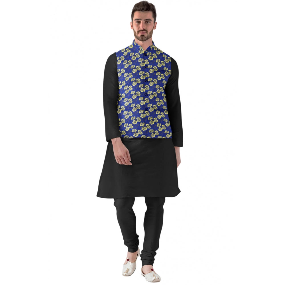 Man wearing a black kurta with a blue and yellow patterned waistcoat on a white background