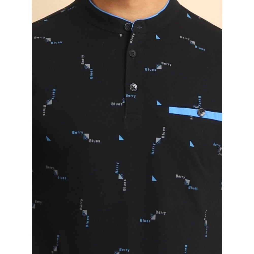 Black shirt with blue and white pattern on a plain background