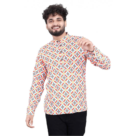 Man wearing a colorful geometric patterned shirt  on a white background
