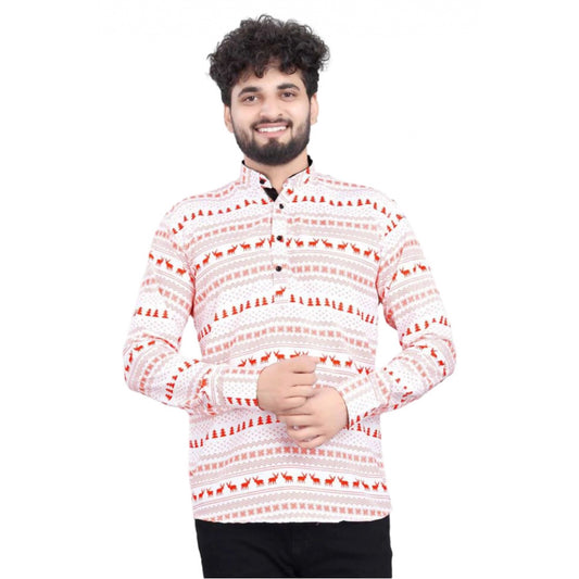 Man wearing a patterned shirt on a white background